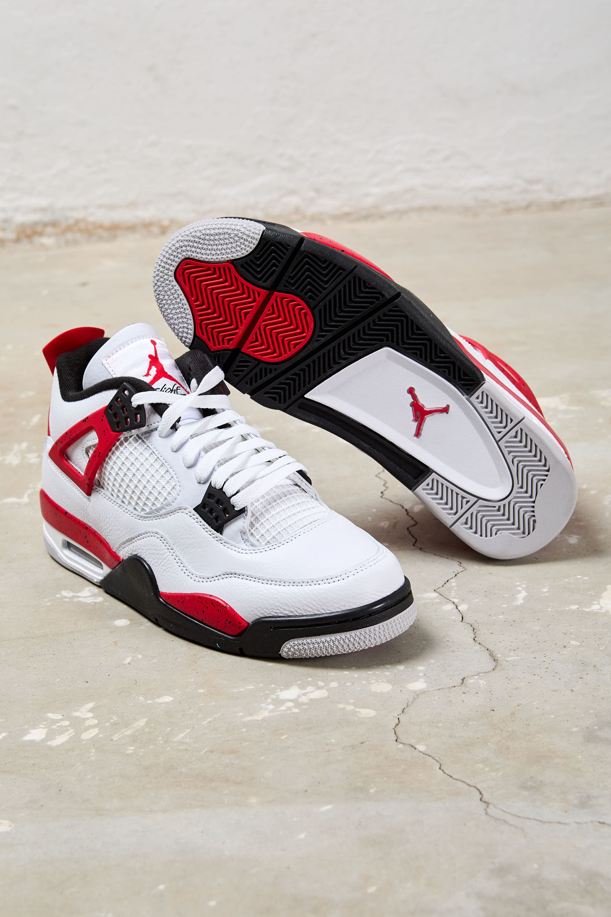 Nike Air Jordan 4 Retro 'Red Cement' in Pelle Bianco Rosso | Kissuomo.it