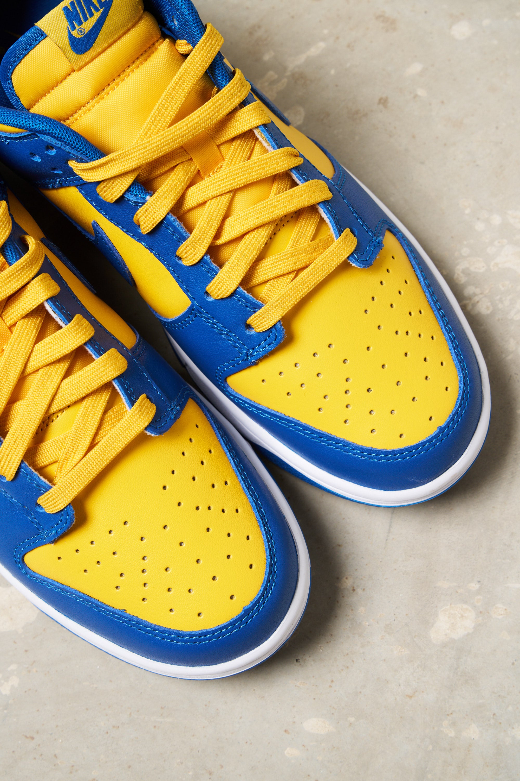 Blue and hotsell yellow nike sneakers